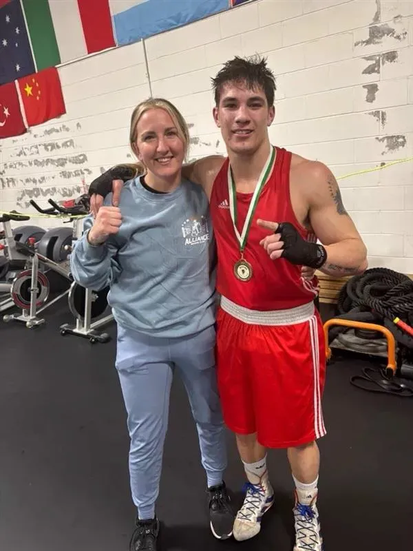 Toye posing with his coach from Sandhills Boxing Club. (Photo courtesy of Jaden Toye)